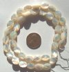 16 inch strand of 11x8mm Faceted Flat Oval Mother of Pearl